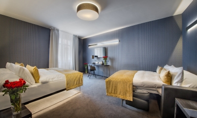 Hotel Mucha Praga - Czteroosobowy pokój Deluxe